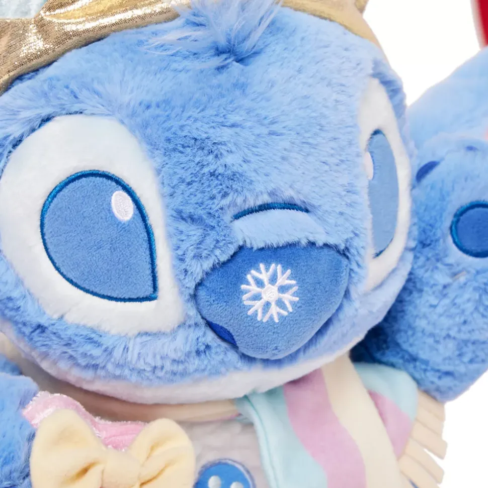 Peluche Stitch avec pochette spéciale fêtes de taille moyenne, Lilo & Stitch