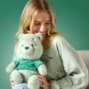Peluche Winnie l'Ourson verte de taille moyenne, 33 cm